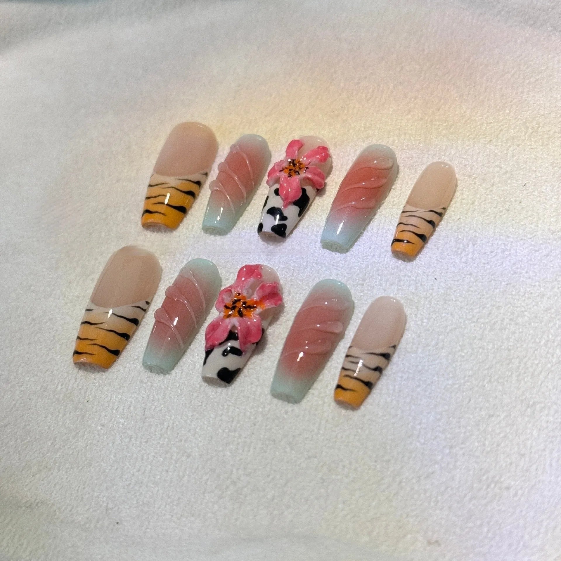 Zebra pattern lily hand carving nail art set with embossed flowers and leopard print in four sizes