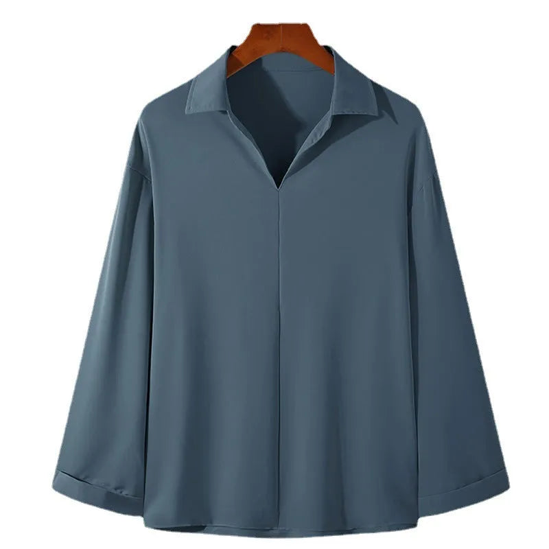 Men's loose lapel casual long sleeve shirt in solid colour on a hanger