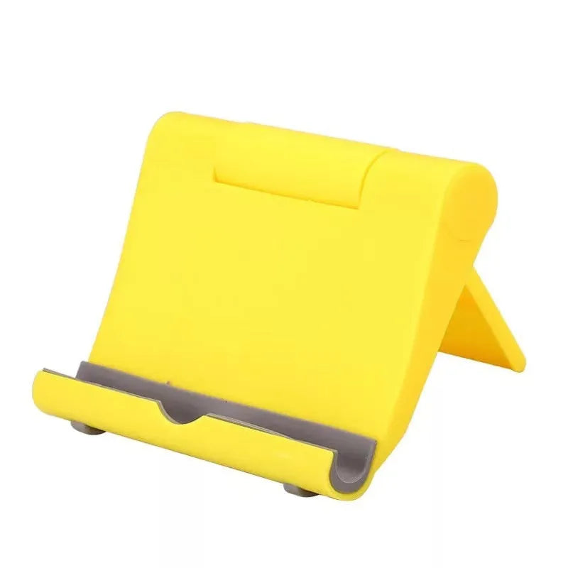 Black PE folding mobile phone stand with soft rubber grip in open position holding a smartphone