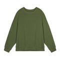 Man wearing a loose-fit, long-sleeved twill jacquard sweater in a solid colour with a round neck.