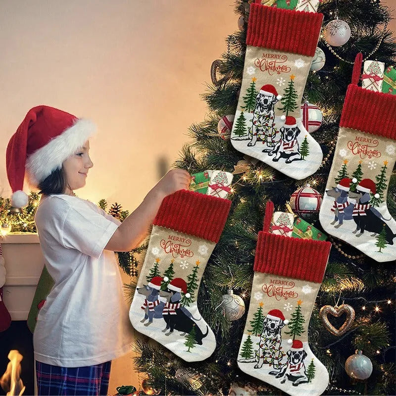 Cloth Christmas gift bag pendant hanging from fireplace measuring 46x28cm in holiday decor setting