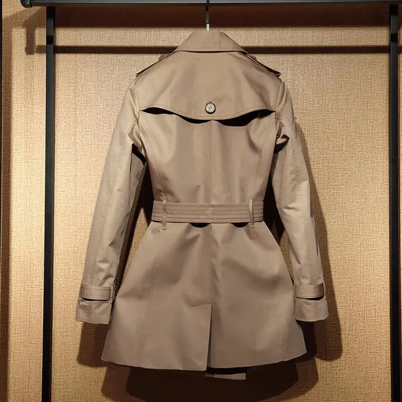 Khaki women's trench coat with double-breasted British styling and flight sleeves