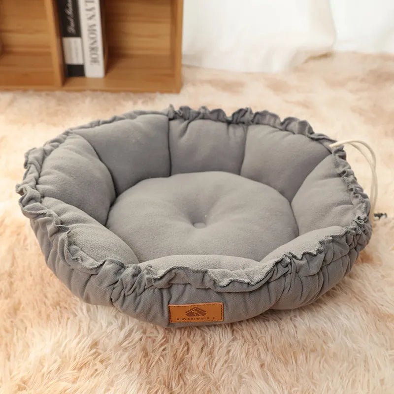 Grey reversible donut cat bed with removable cushion for indoor pets