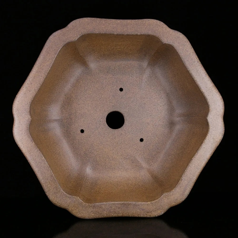 Handmade tea-coloured purple sand flower pot in a large hexagonal or begonia basin shape.