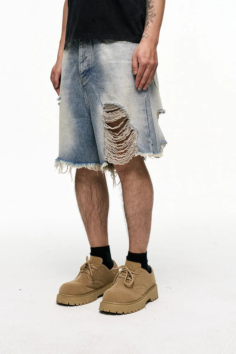 Men's light blue denim shorts with baggy wide leg cut and retro washed finish