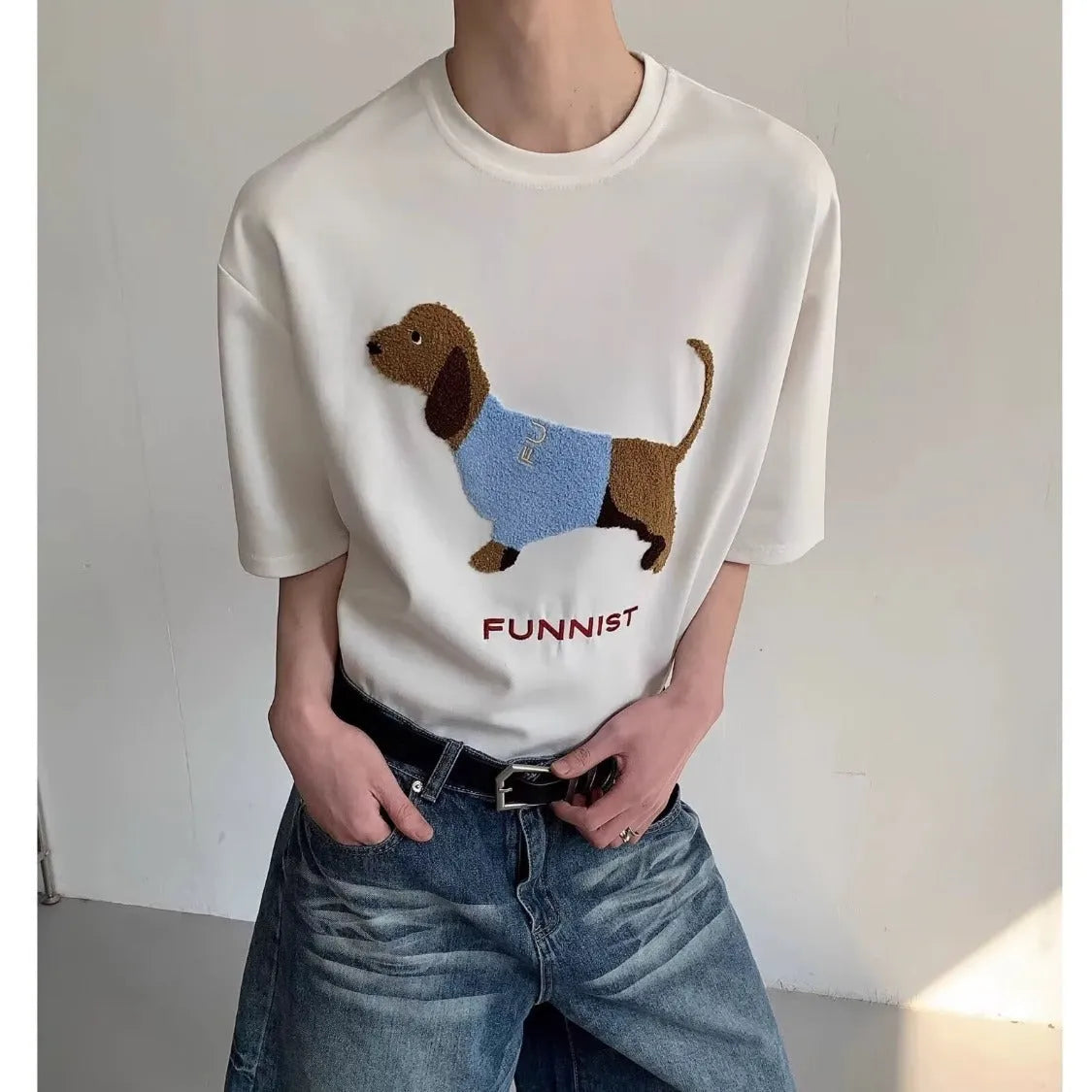 Grey men's cotton t-shirt with a detailed embroidered sausage dog design on the chest.