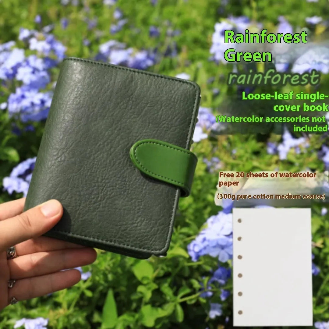 A7 loose-leaf watercolour notebook with twin-wire binding shown in avocado green colour