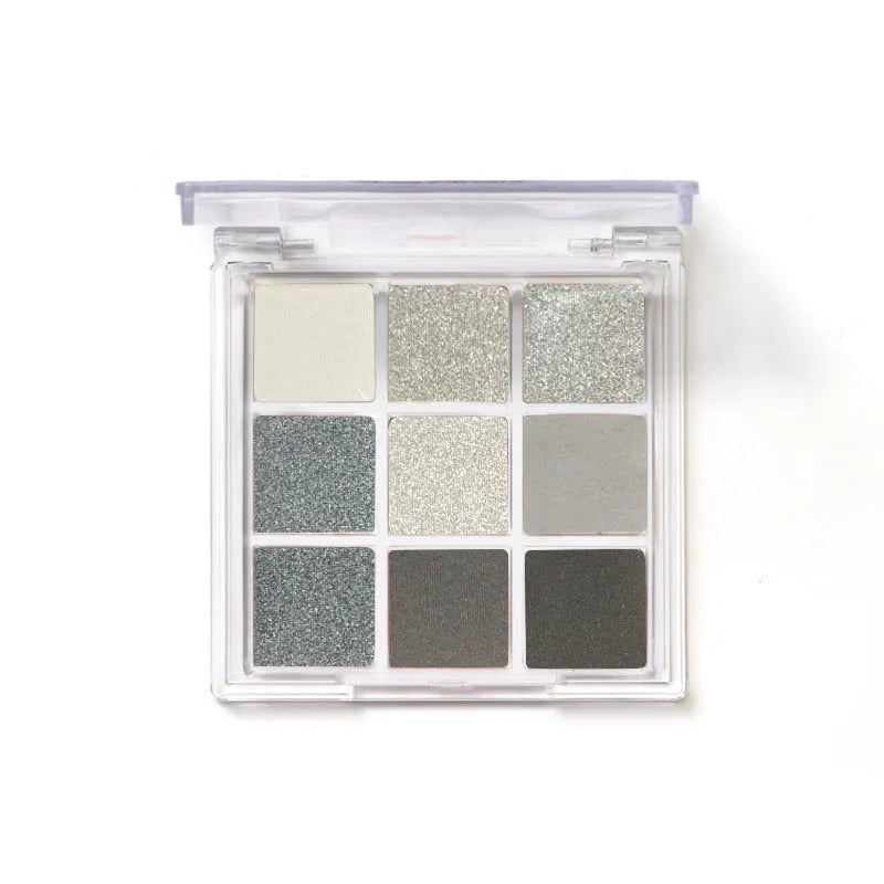 Smoked design nine-colour eyeshadow palette showing white, silver, black, and iron grey shades
