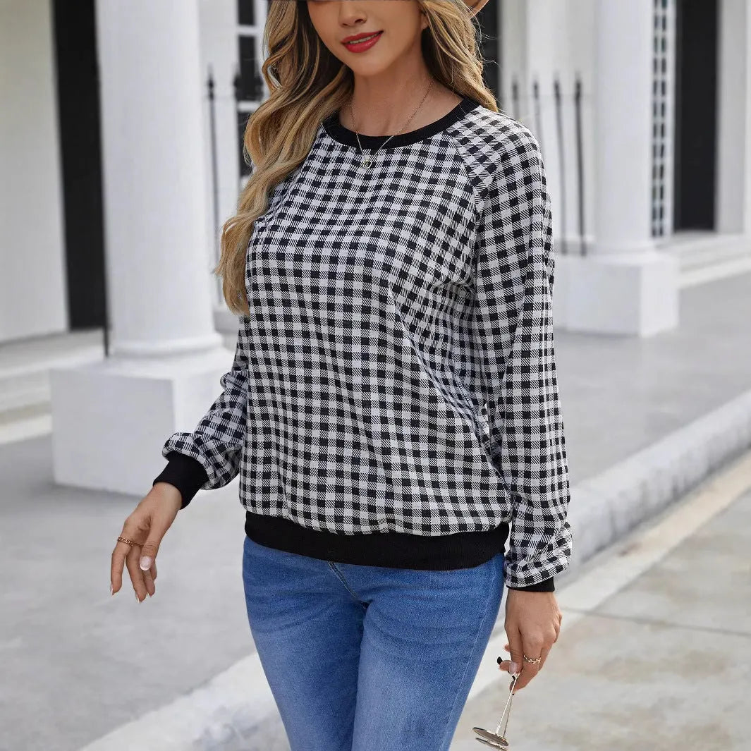 Black long sleeve pullover sweater with a Japanese sweet plaid and stripe pattern on a mannequin.