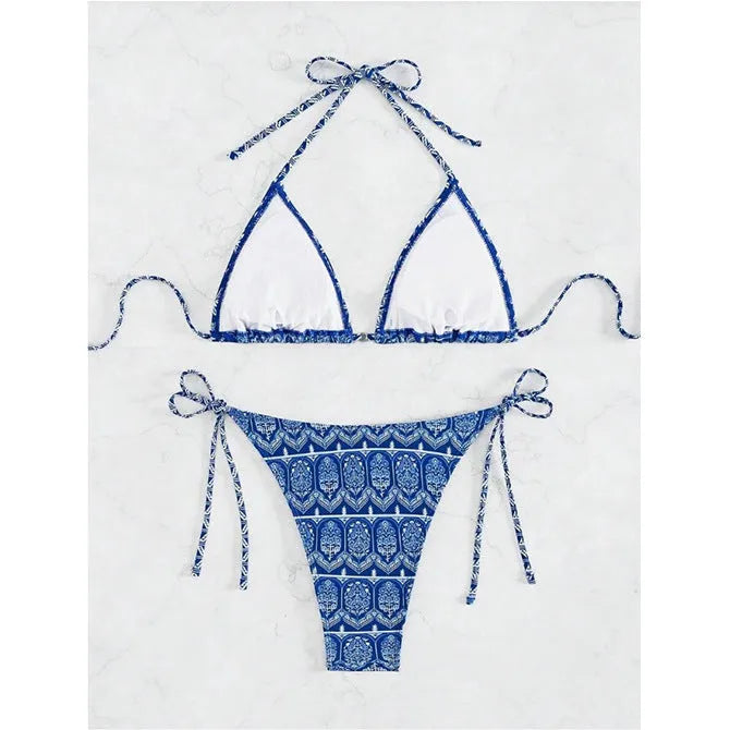 Women's green split bikini swimsuit with bandage stitching detail on the top and briefs.