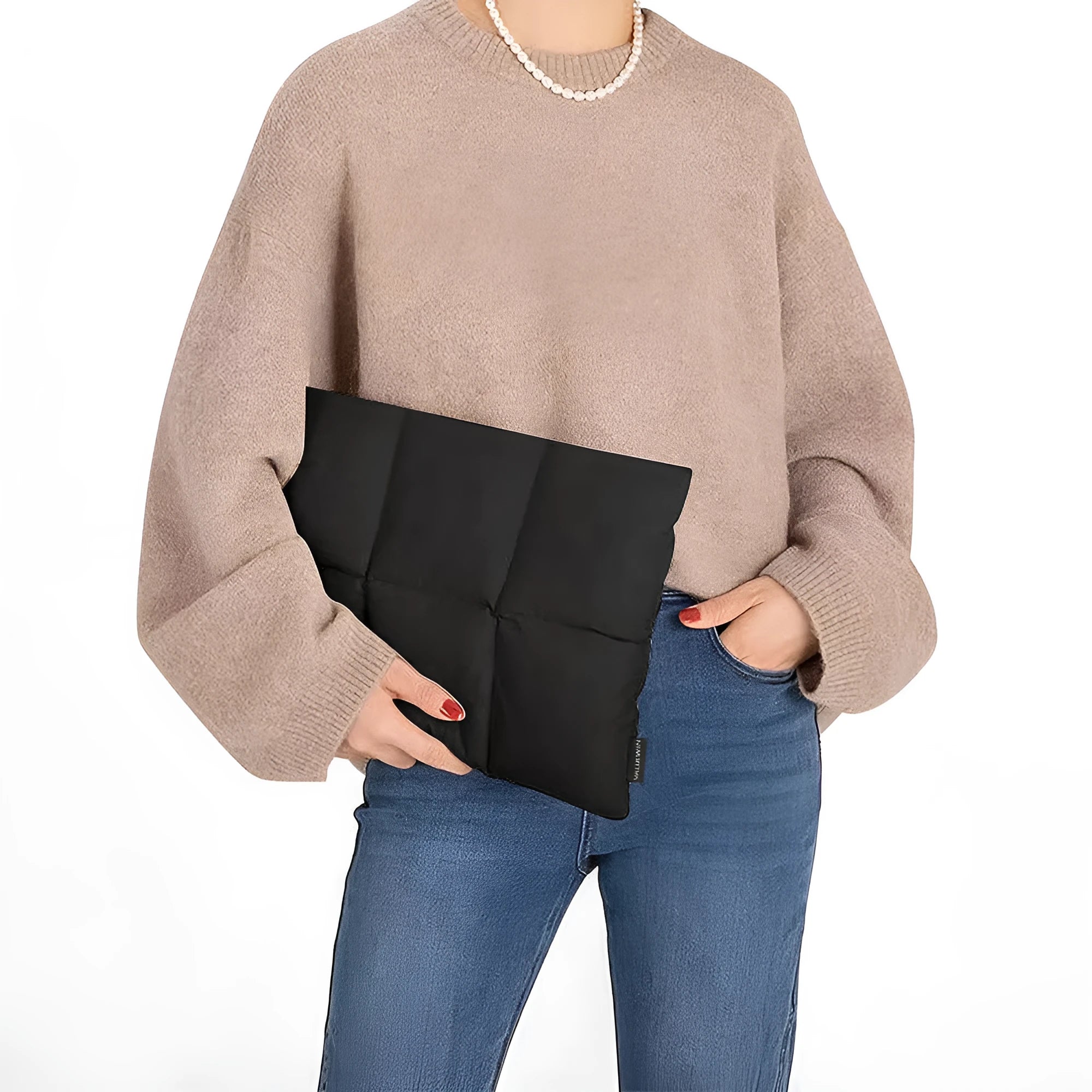 Soft black polyester laptop sleeve for a 15.6-inch laptop on a table.