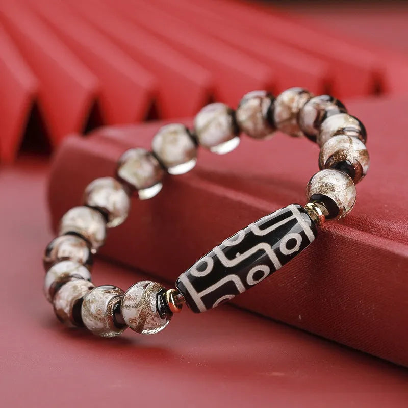 Chinese style bracelet with colourful glaze beads and a central snake charm, showing 10mm bead size option.