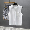 A man's solid black cotton sleeveless t-shirt with a loose fit and straight hem, laid flat.