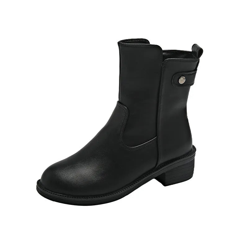 Black women's ankle boots with side zip and low round toe on a rubber sole.