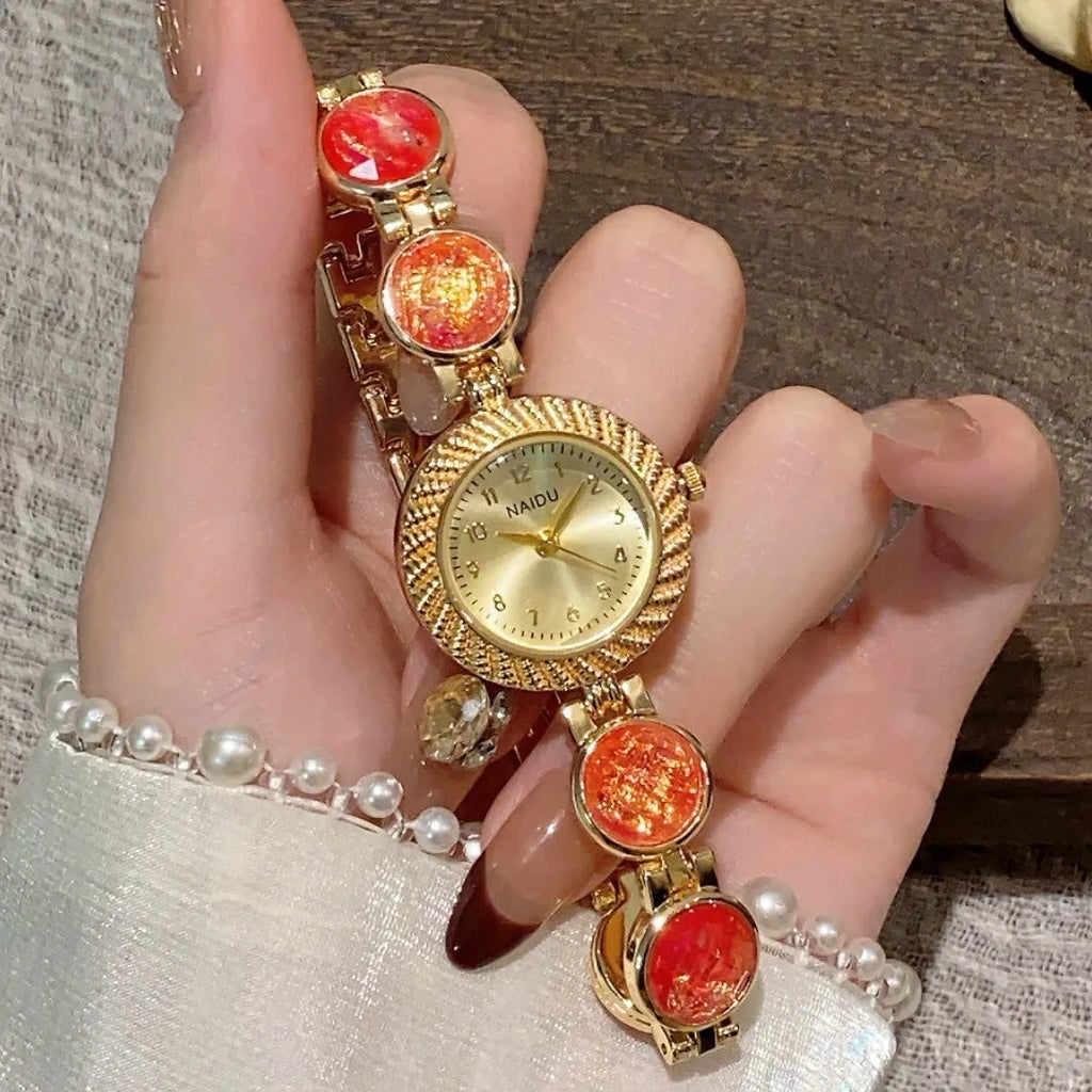 Women's quartz watch with 25mm round dial in zinc alloy case showing spiral crown and colour options