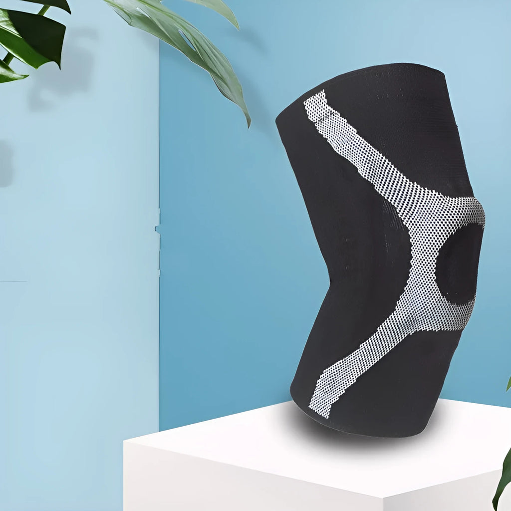 Red and grey silicone sports kneecaps for running and climbing, showing non-slip design.