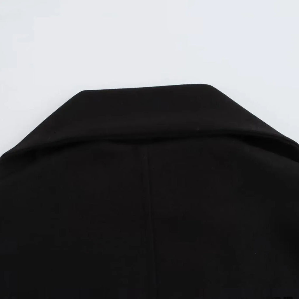 Women's longline street fashion coat with artificial fur collar in lengthened silhouette
