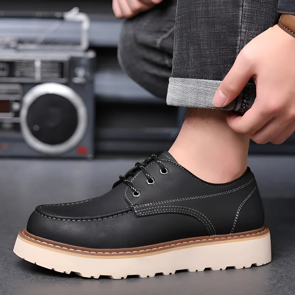 Men's black retro low-top Martin boots with a round toe and non-slip rubber sole.