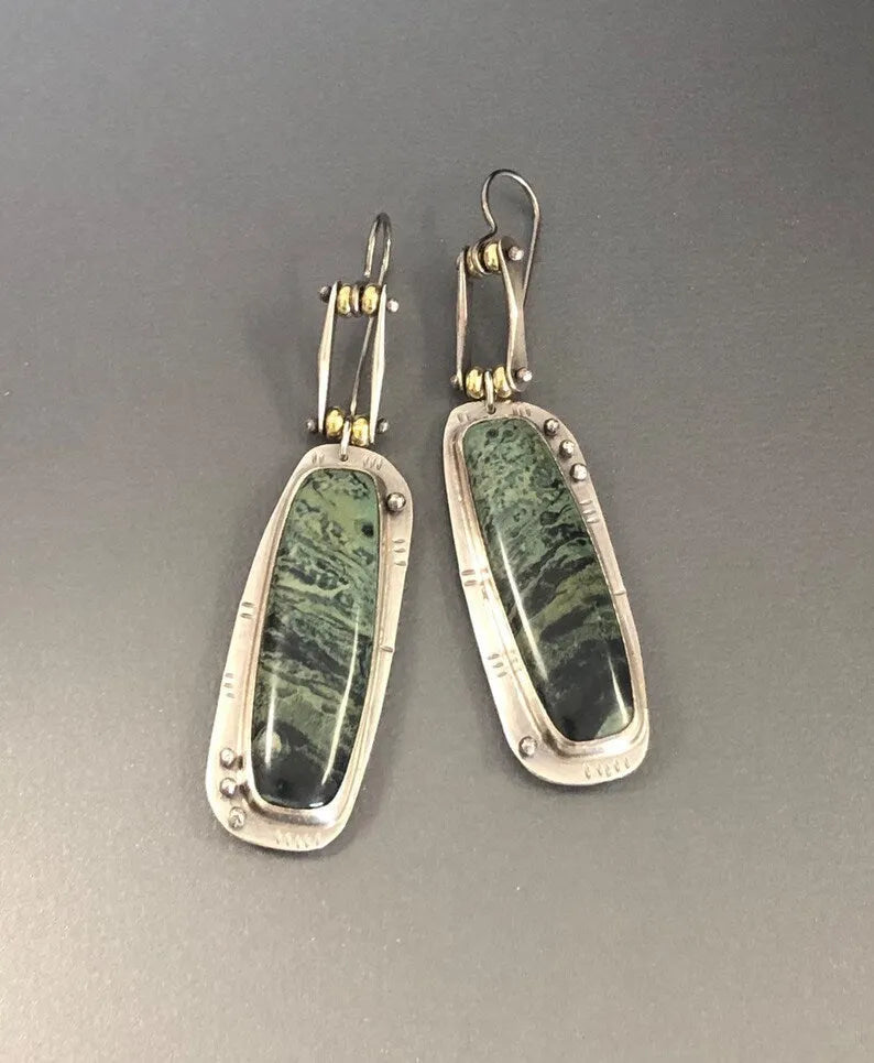 Geometric two-tone marble pattern alloy earrings showing angular shape with marbled colour detailing