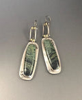 Geometric two-tone marble pattern alloy earrings showing angular shape with marbled colour detailing