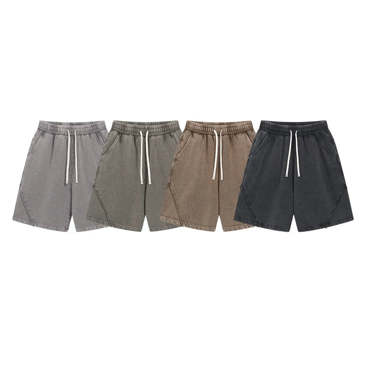 Men's loose-fit retro shorts in batik-washed cotton terry fabric, shown in a batik black colour.