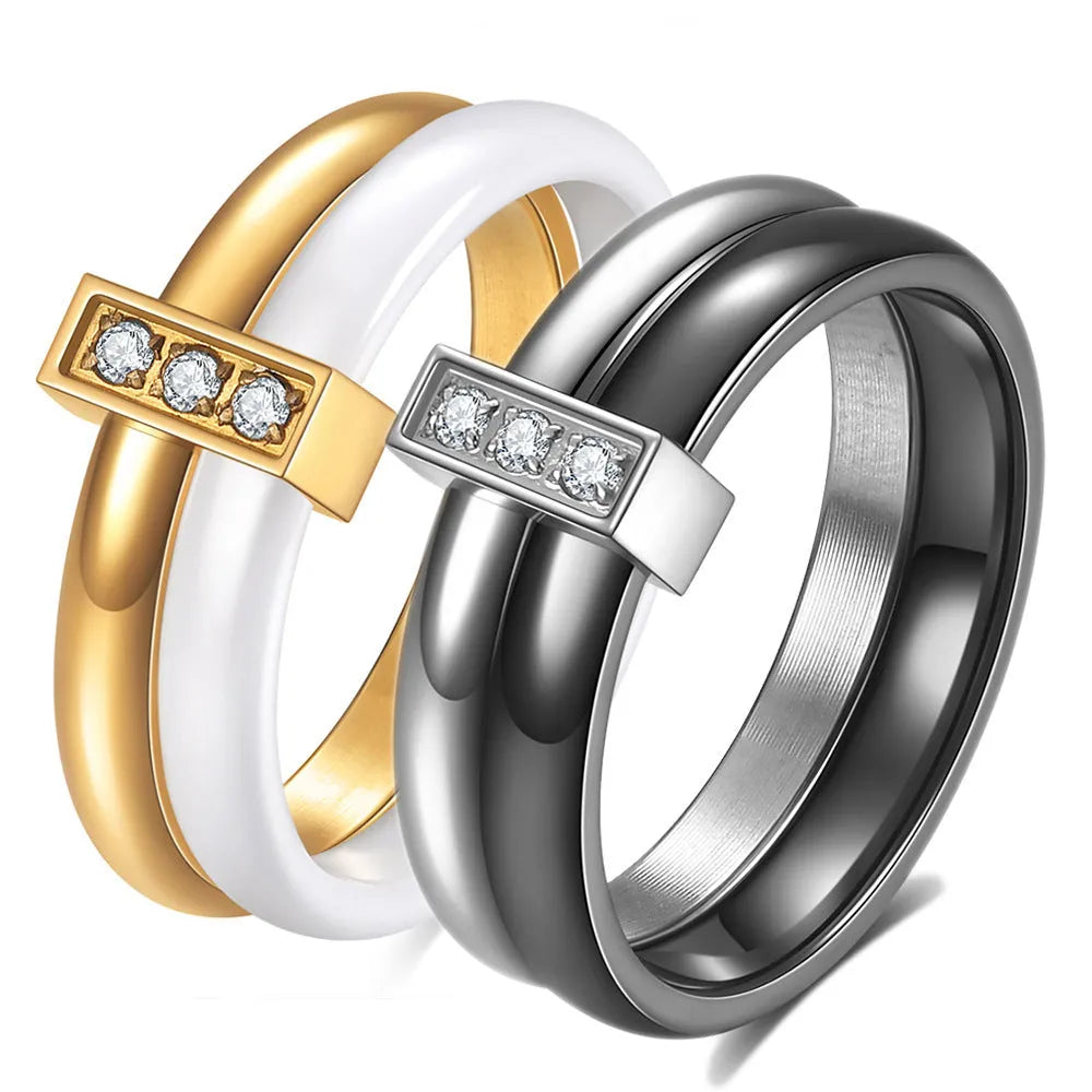 Glossy ceramic women's ring with geometric shape and stitching detail in steel black or gold white finish