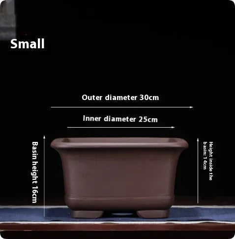 Large purple clay Chinese style flower pot for indoor bonsai or plants.