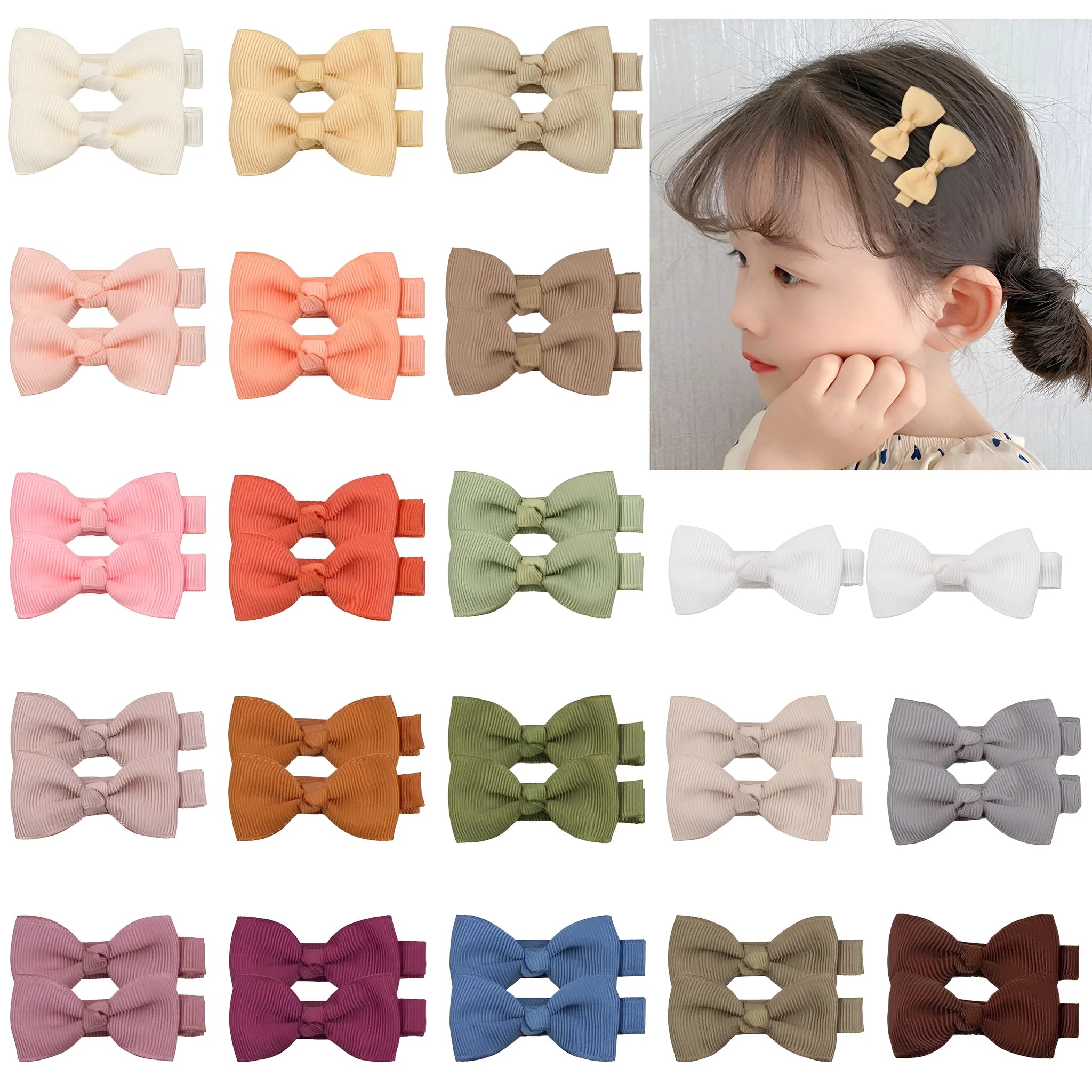 Assortment of pastel coloured baby hair clips and bows with no-slip lining.