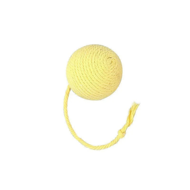 Green cat toy ball with a rope handle looped through it, shown next to a smaller pink version.