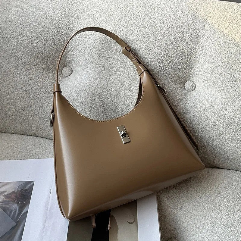 Genuine leather dumpling-shaped crossbody bag with organised compartments in six colour options