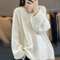 White women's V-neck long sleeve pullover sweater made from viscose knit fabric on a hanger.