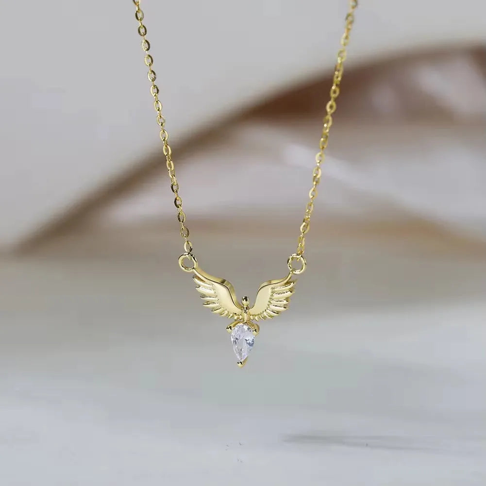 Women's silver eagle pendant necklace with adjustable O-ring chain in white gold or yellow gold finish