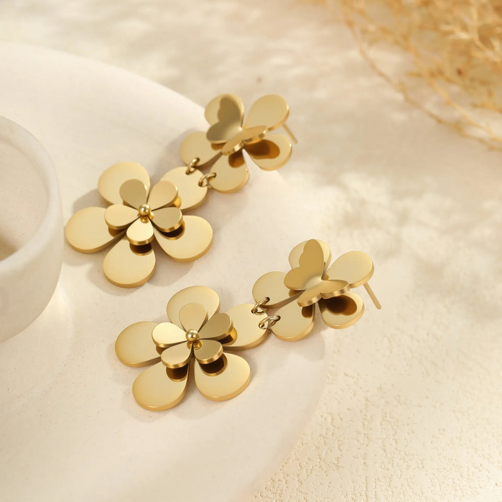 Gold plated stainless steel earrings featuring flower and butterfly geometric design for women