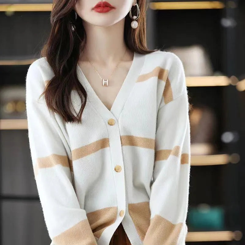 Women's slim fit striped cardigan with 3D pattern texture, V-neck, and button front closure.