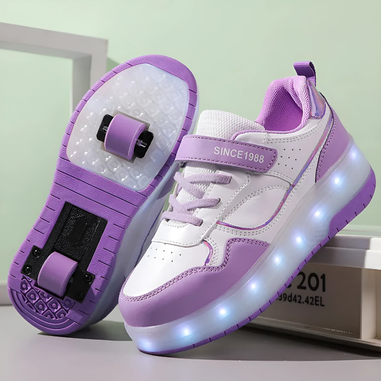 Kids charging flash rollerskates with LED lights in pink black white purple sizes 29-40
