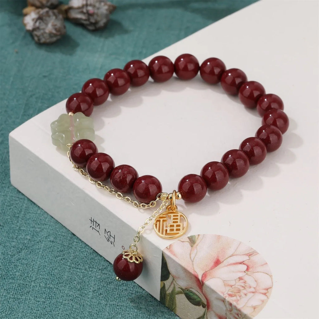 Women's cinnabar bracelet with fu character design and tassel in national style