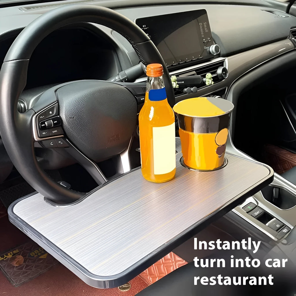 Large black ABS car steering wheel laptop stand with integrated foldable cup holder, mounted on a car steering wheel.