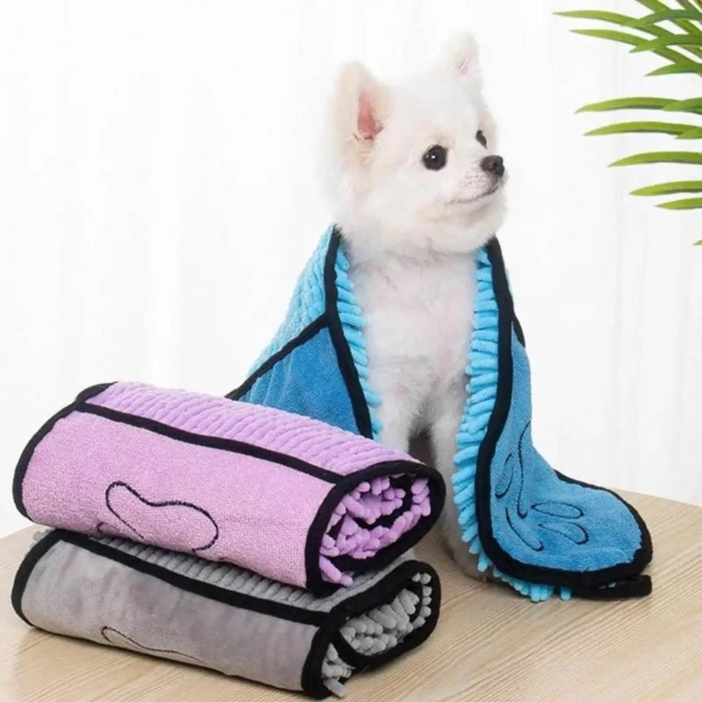 Blue dog bath towel with quick-dry absorbent fibre, measuring 62cm by 23cm.