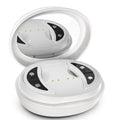 White wireless red light eye and facial massager with EMS technology held in hand