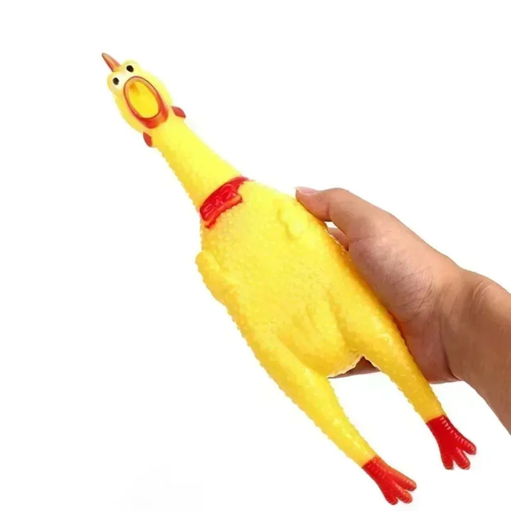 Yellow rubber screaming chicken dog toy with squeaker in three size options