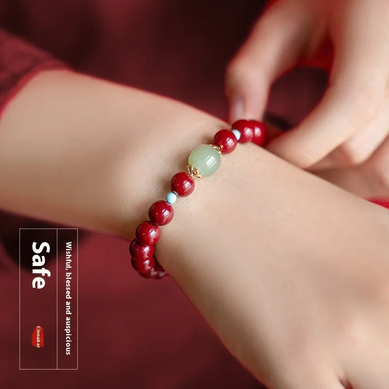 Purple gold sand cinnabar and Hetian jade bead bracelet with coated metal, showing geometric ellipse beads.