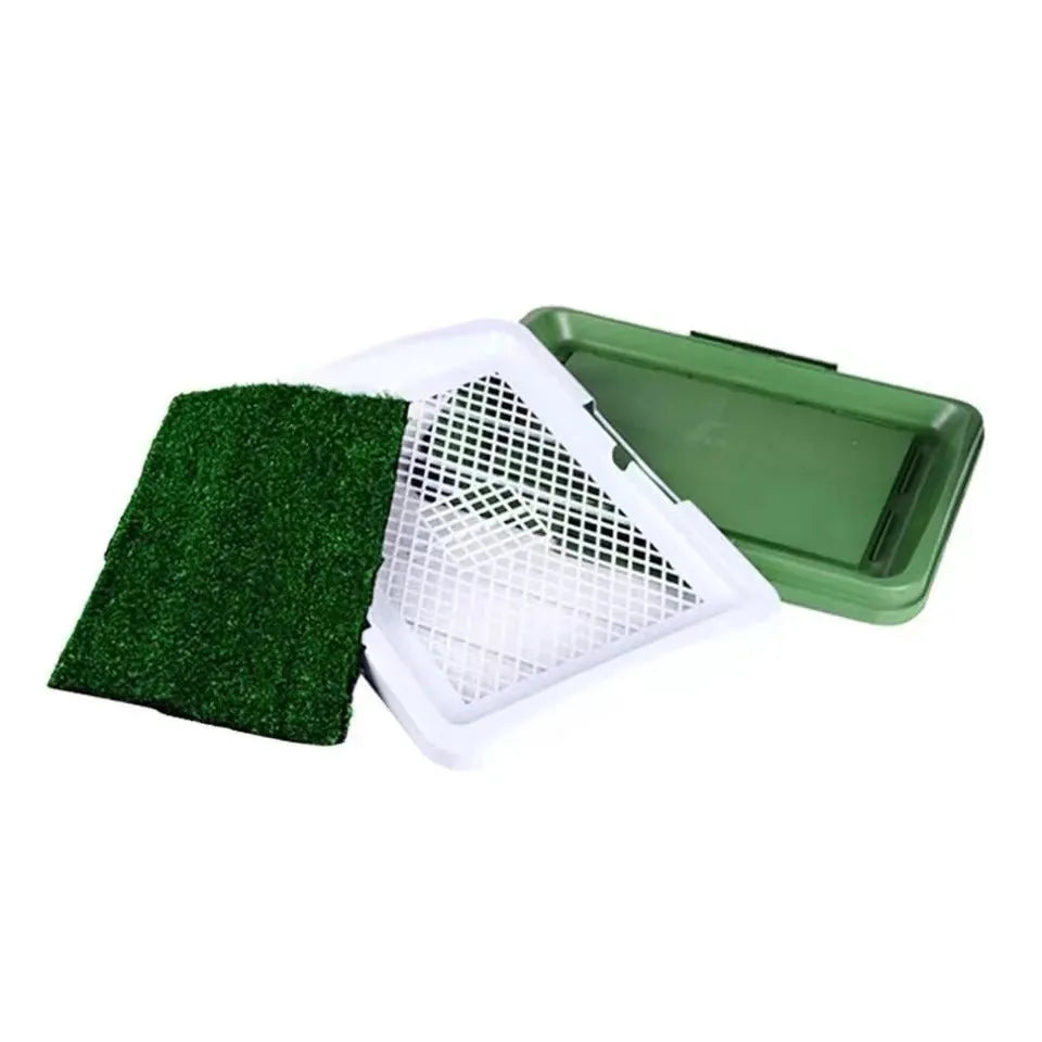 Green artificial grass indoor dog toilet training tray with three-layer construction.