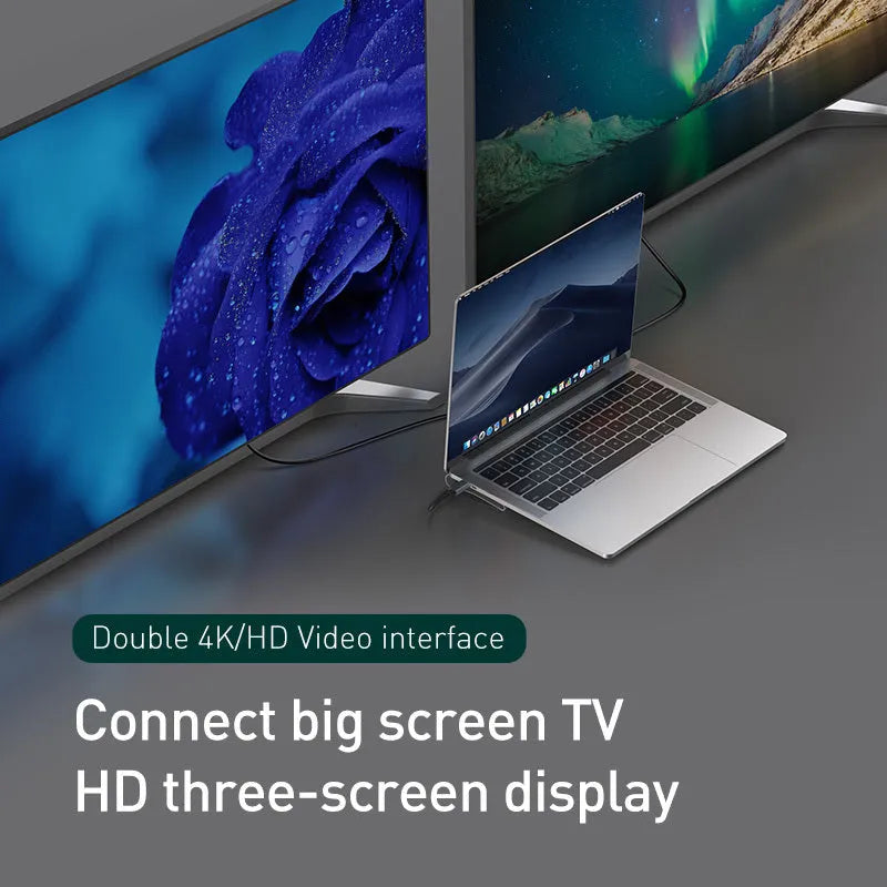 Gray aluminium USB C hub docking station with cooling bracket showing 10 ports including HDMI and Ethernet
