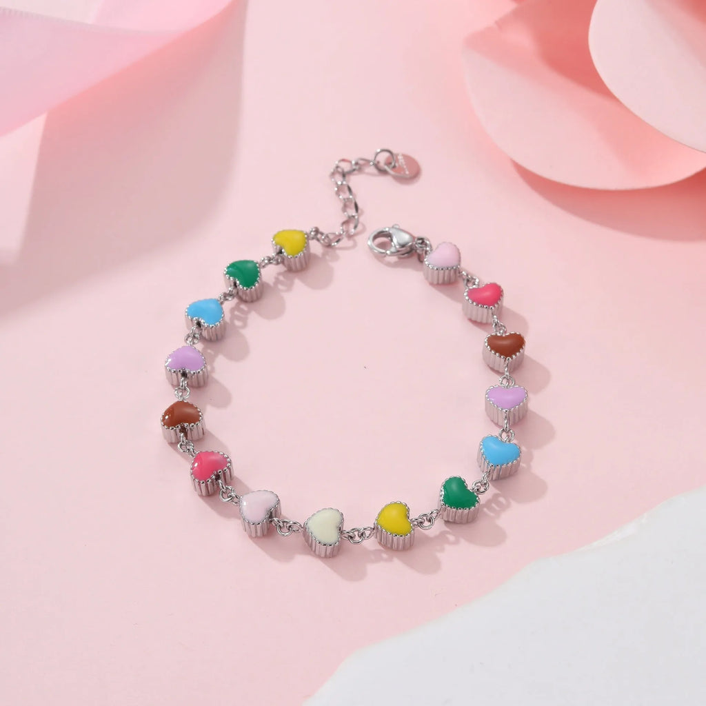 Women's stainless steel bracelet with heart pendant and colourful oil necklace elements