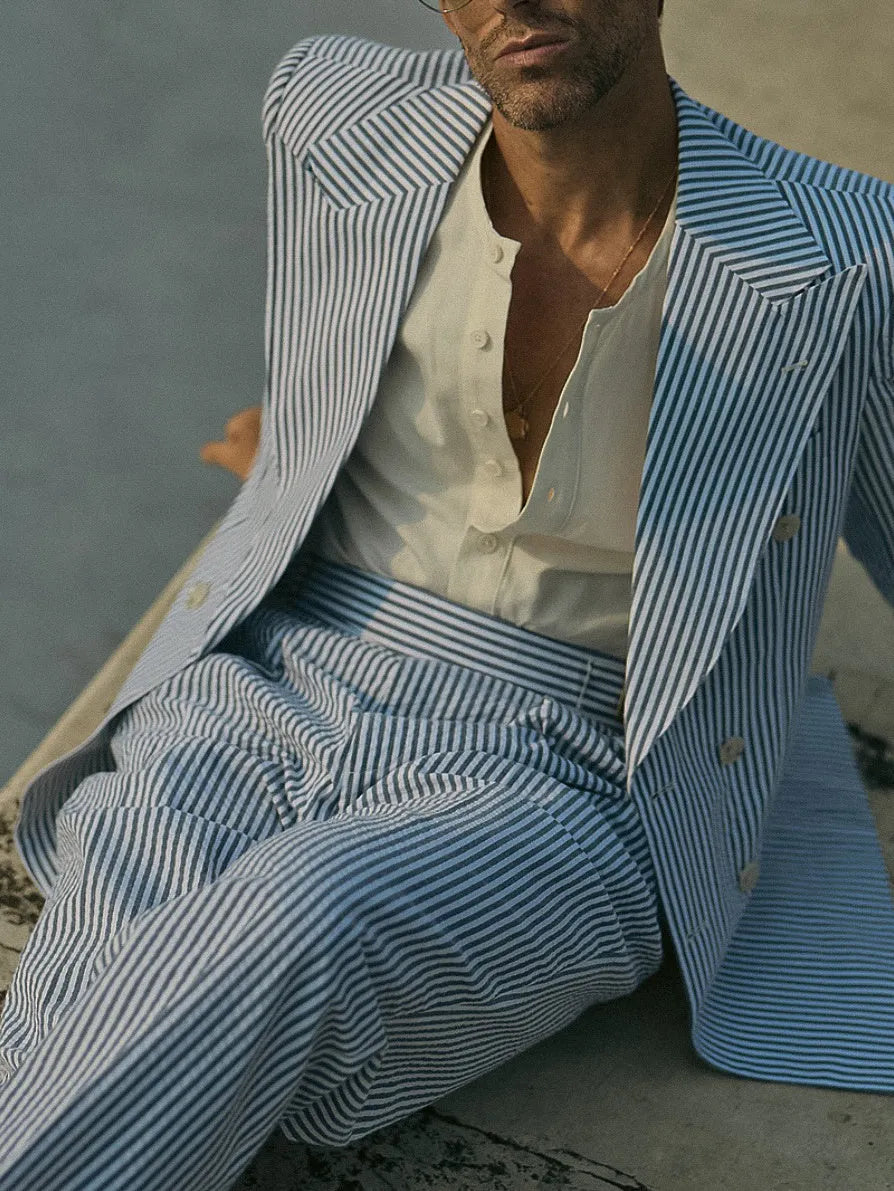 Blue and white striped men's suit set with blazer and trousers on a mannequin