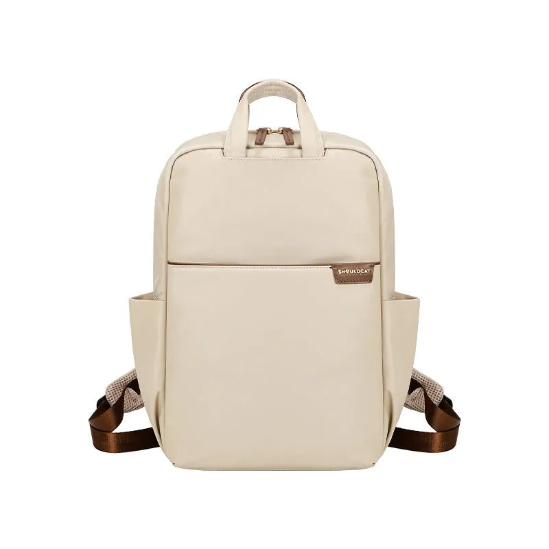 Women's canvas travel backpack in three sizes with multiple internal organisational compartments