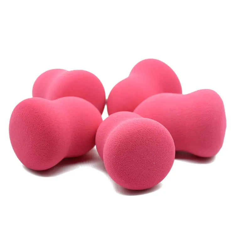 Pink hydrophilic non-latex makeup sponge puff measuring 4 by 4 by 5.6 centimetres.
