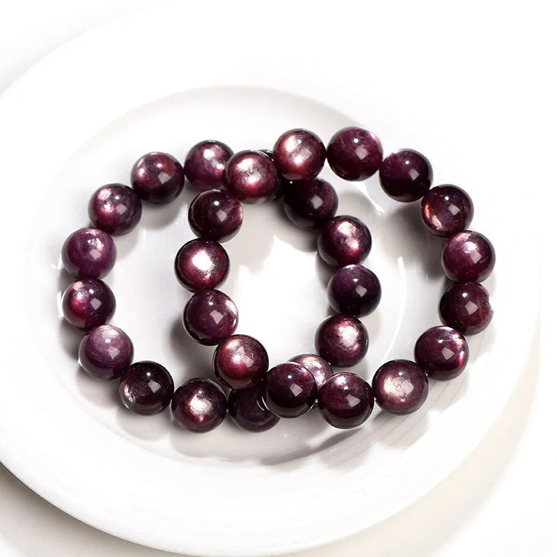 Natural purple lepidolite crystal bracelet with polished round beads in various size options.