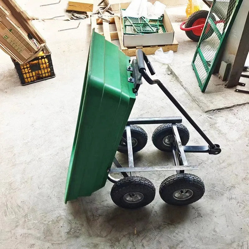 Green four-wheel plastic and steel dump truck with load bed, model TC2145