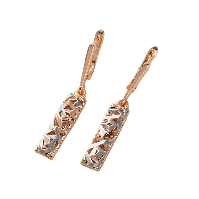 Rectangular two-tone hollow stud earrings with geometric design and silver electroplated finish